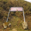 Cartel del dolmen derribado