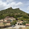 El Castillo sobre los tejados de Astulez