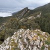 Cumbre de la cuarta Peña de las Cinco con vistas a la tercera.